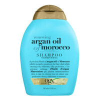 Bottle  of  Ogx  Argan  Oil  Renewing  Hair  Shampoo  by  Ogx,  a  shampoo  indicated  for  moisturizing  and  strengthening  devitalized  hair.