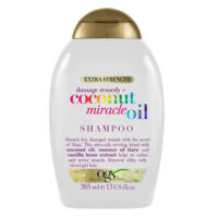 Bottle  of  Ogx  Coconut  Miracle  Oil  Shampoo  by  Ogx,  a  shampoo  indicated  for  moisturizing  and  revitalizing  damaged  hair.