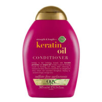 Bottle  of  Ogx  Keratin  Oil  Conditioner  by  Ogx,  a  conditioner  indicated  for  strengthening  and  repairing  brittle  hair.