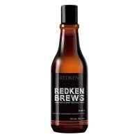 Bottle  of  Redken  Brews  3-in-1  Shampoo,  Conditioner  and  Body  Wash  by  Redken,  a  cleanser  indicated  for  hair  and  body  care.