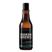 Bottle  of  Redken  Brews  Mint  Shampoo  by  Redken,  a  refreshing  shampoo  indicated  for  cleansing  and  invigorating  the  scalp.