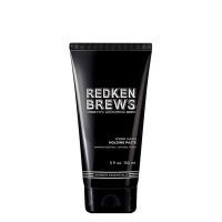 Jar  of  Redken  Brews  Work  Hard  Molding  Paste  by  Redken,  a  hair  paste  indicated  for  maximum  hold  and  sculpted  hairstyles.
