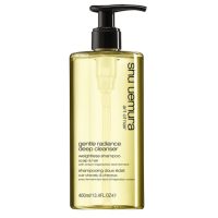 Bottle  of  Gentle  Radiance  Weightless  Shampoo  by  Shu  Uemura,  a  lightweight  shampoo  indicated  for  cleansing  and  enhancing  radiance.