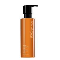 Bottle  of  Shu  Uemura  Urban  Moisture  Hydro-Nourishing  Conditioner,  a  creamy  conditioner  indicated  for  dry  hair  hydration.