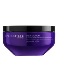 Jar  of  Shu  Uemura  Yubi  Blonde  Anti-Brass  Purple  Balm,  a  creamy  hair  mask  indicated  for  neutralizing  brassy  blonde  tones.