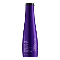 Bottle  of  Shu  Uemura  Yubi  Blonde  Anti-Brass  Purple  Shampoo,  a  creamy  shampoo  indicated  for  neutralizing  yellow  blonde  tones.