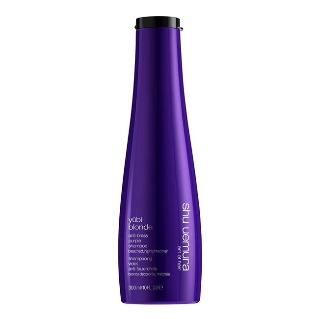 ShuUemuraYubiBlondeAnti-BrassPurpleShampoo300ml Bottle of Shu Uemura Yubi Blonde Anti-Brass Purple Shampoo, a creamy shampoo indicated for neutralizing yellow blonde tones.