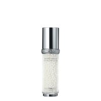 Bottle  of  La  Prairie  White  Caviar  Pearl  Infusion  by  La  Prairie,  a  rich  serum  indicated  for  reducing  redness  and  dark  spots.