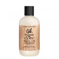Bottle  of  Bumble  and  Bumble  Creme  de  Coco  Shampoo  by  Bumble  and  Bumble,  a  moisturizing  shampoo  indicated  for  hydrating  all  hair.