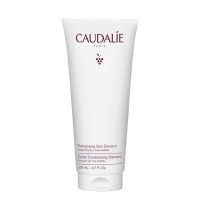 Bottle  of  Caudalie  Gentle  Conditioning  Shampoo  by  Caudalie,  a  liquid  shampoo  indicated  for  cleansing  and  strengthening  sensitive  hair.