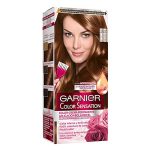 Box  of  Garnier  Color  Sensation  Permanent  Hair  Color  6.35  Caramel  Blonde  by  Garnier,  a  hair  dye  indicated  for  full  gray  hair  coverage.