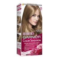 Box  of  Garnier  Color  Sensation  Permanent  Hair  Color  7.0  Blonde  by  Garnier,  a  hair  color  cream  for  intense  root  touch-up.