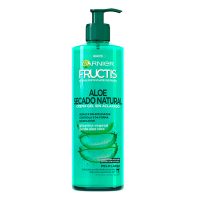 Bottle  of  Garnier  Fructis  Aloe  Hydra  Bomb  Air-Dry  Cream  by  Garnier,  a  leave-in  cream  indicated  for  moisturizing  and  anti-frizz.
