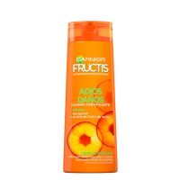 Bottle  of  Garnier  Fructis  Goodbye  Damage  Shampoo  by  Garnier,  a  repairing  shampoo  indicated  for  damaged  hair  and  surface  cracks.