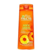 Bottle  of  Garnier  Fructis  Goodbye  Damage  Shampoo  by  Garnier,  a  repairing  shampoo  indicated  for  damaged  hair  and  surface  cracks.