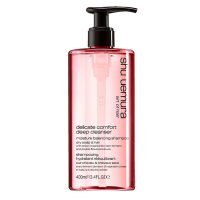 Bottle  of  Shu  Uemura  Delicate  Confort  Deep  Cleanser  Shampoo,  a  shampoo  indicated  for  deep  cleansing  and  restoring  moisture  to  dry  hair.
