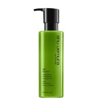 Bottle  of  Shu  Uemura  Silk  Bloom  Restorative  Conditioner  by  Shu  Uemura,  a  conditioner  indicated  for  repairing  frizzy  or  damaged  hair.