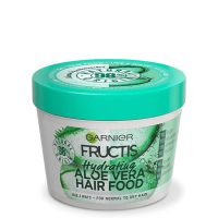 Jar  of  Garnier  Fructis  Hair  Food  Aloe  Vera  Hydrating  Mask  by  Garnier,  a  3-in-1  mask  indicated  for  moisturizing  and  purifying  dry  hair.