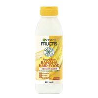 Bottle  of  Garnier  Fructis  Hair  Food  Banana  Ultra-Nourishing  Conditioner  by  Garnier,  a  conditioner  indicated  for  nourishing  dry  hair.
