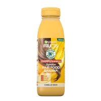 Bottle  of  Garnier  Fructis  Hair  Food  Banana  Ultra-Nourishing  Shampoo  by  Garnier,  a  shampoo  indicated  for  nourishing  and  softening  dry  hair.