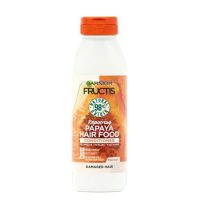 Bottle  of  Garnier  Fructis  Hair  Food  Papaya  Repairing  Conditioner  by  Garnier,  a  conditioner  indicated  for  repairing  and  shining  damaged  hair.