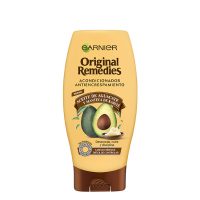 Bottle  of  Garnier  Original  Remedies  Avocado  and  Shea  Butter  Conditioner  by  Garnier,  a  conditioner  indicated  for  unruly  and  frizzy  hair.