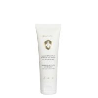 Tube  of  Guerlain  Abeille  Royale  Repairing  &  Youth  Hand  Balm  by  Guerlain,  a  rich  balm  indicated  for  nourishing  dry  hand  skin.