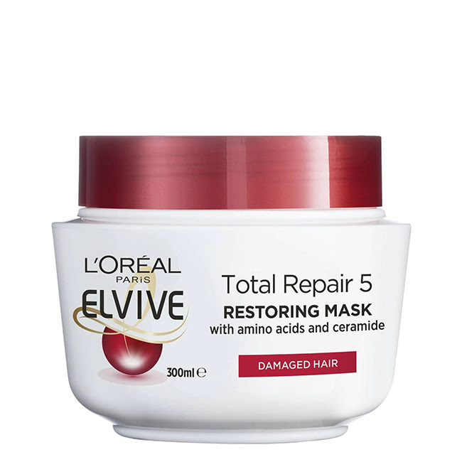 L'OrealElviveTotalRepair5RepairingMask300ml Jar of LOreal Elvive Total Repair 5 Repairing Mask by LOreal, a hair mask indicated for damaged hair.