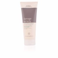 Bottle  of  Aveda  Damage  Remedy  Restructuring  Conditioner  by  Aveda,  a  conditioner  indicated  for  repairing  and  strengthening  damaged  hair.