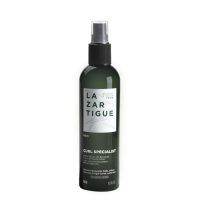 Spray  of  Curl  Specialist  Curl  Awakening  Spray  by  Lazartigue,  a  vegan  mist  indicated  for  redefining  curls  and  sun  protection.