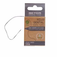 Product  container  of  Beter  Dental  Floss  Activated  Charcoal  by  Beter,  a  dental  floss  indicated  for  deep  plaque  removal.