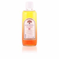 Bottle  of  Crusellas  Ron  Quina  Extra  Hair  Tonic  by  Crusellas,  a  revitalizing  tonic  indicated  for  hair  loss  and  dandruff.