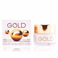 Jar  of  Diet  Esthetic  Gold  Essence  Gold  Cream  SPF15  by  Diet  Esthetic,  a  facial  cream  indicated  for  hydration  and  skin  regeneration.