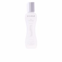 Bottle  of  Farouk  Biosilk  Silk  Therapy  Original  by  Farouk,  a  leave-in  treatment  indicated  to  repair  and  smooth  hair.