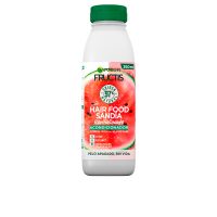 Jar  of  Garnier  Fructis  Hair  Food  Watermelon  Conditioner  by  Garnier,  a  conditioner  indicated  for  detangling  and  moisturizing  hair.