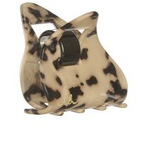Product  container  of  Invisibobble  Everclaw  Leo  Love  by  Invisibobble,  a  hair  claw  indicated  for  creating  an  elegant  and  strong  hold  style.
