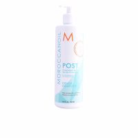 Bottle  of  Moroccanoil  Chromatech  Post  by  Moroccanoil,  a  restorative  treatment  indicated  for  repairing  color  treated  hair.