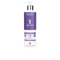 Bottle  of  Neomoshÿ  Blonde  Ultraviolet  Ω9  Shampoo  by  Neomoshÿ,  a  creamy  shampoo  indicated  for  neutralizing  brassy  tones.