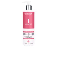 Bottle  of  Neomoshÿ  Magnificent  Volume  Shampoo  by  Neomoshÿ,  a  creamy  shampoo  indicated  for  volumizing  fine  and  flat  hair.