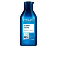 Bottle  of  Redken  Extreme  Conditioner  by  Redken,  a  repairing  conditioner  indicated  for  strengthening  damaged  hair.