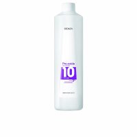 Bottle  of  Redken  Pro-Oxide  Developer  10  Vol.  by  Redken,  a  developer  indicated  for  professional  hair  coloring  results.
