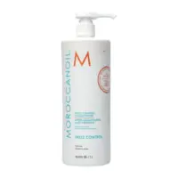 Bottle  of  Moroccanoil  Smooth  Frizz  Control  Conditioner  by  Moroccanoil,  a  conditioner  indicated  for  unruly  and  frizzy  hair.