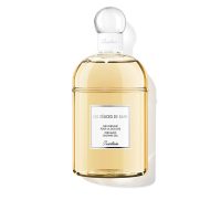 Bottle  of  Guerlain  Le  Délice  De  Bain  Shower  Gel  by  Guerlain,  a  silky  shower  gel  indicated  for  cleansing  and  hydrating  skin.