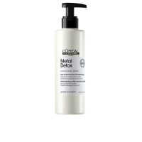 Bottle  of  LOréal  Professionnel  Metal  Detox  Pre-Shampoo  Treatment  by  LOréal,  a  treatment  indicated  for  detoxifying  hair.