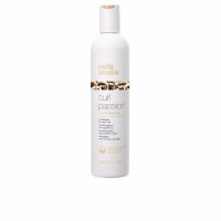 Bottle  of  Milk  Shake  Curl  Passion  Conditioner  by  Milk  Shake,  a  conditioner  indicated  for  hydrating  and  managing  curly  hair.