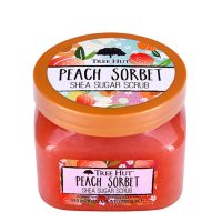 Jar  of  Tree  Hut  Peach  Sorbet  Shea  Sugar  Scrub  by  Tree  Hut,  a  sugar  scrub  indicated  for  removing  dead  cells  and  radiance.