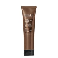 Bottle  of  All  Soft  Mega  Curls  Hydramelt  Leave-in  Treatment  by  Redken,  a  leave-in  cream  indicated  for  dry  curls  and  coils.