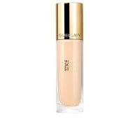 Bottle  of  Guerlain  Parure  Gold  Radiance  Foundation  Color  2W  by  Guerlain,  a  liquid  foundation  indicated  for  a  luminous  effect.