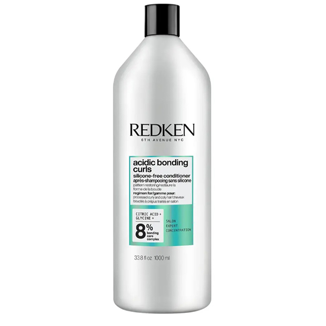 RedkenAcidicBondingCurlsConditioner1000ml Bottle of Redken Acidic Bonding Curls Conditioner by Redken, a fortifying conditioner indicated for damaged curls and coils.