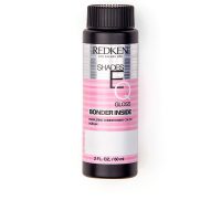 Box  of  Redken  Shades  EQ  Gloss  Bonder  Inside  Color  000  Clear,  a  liquid  toner  and  bonder  to  strengthen  sensitized  hair.